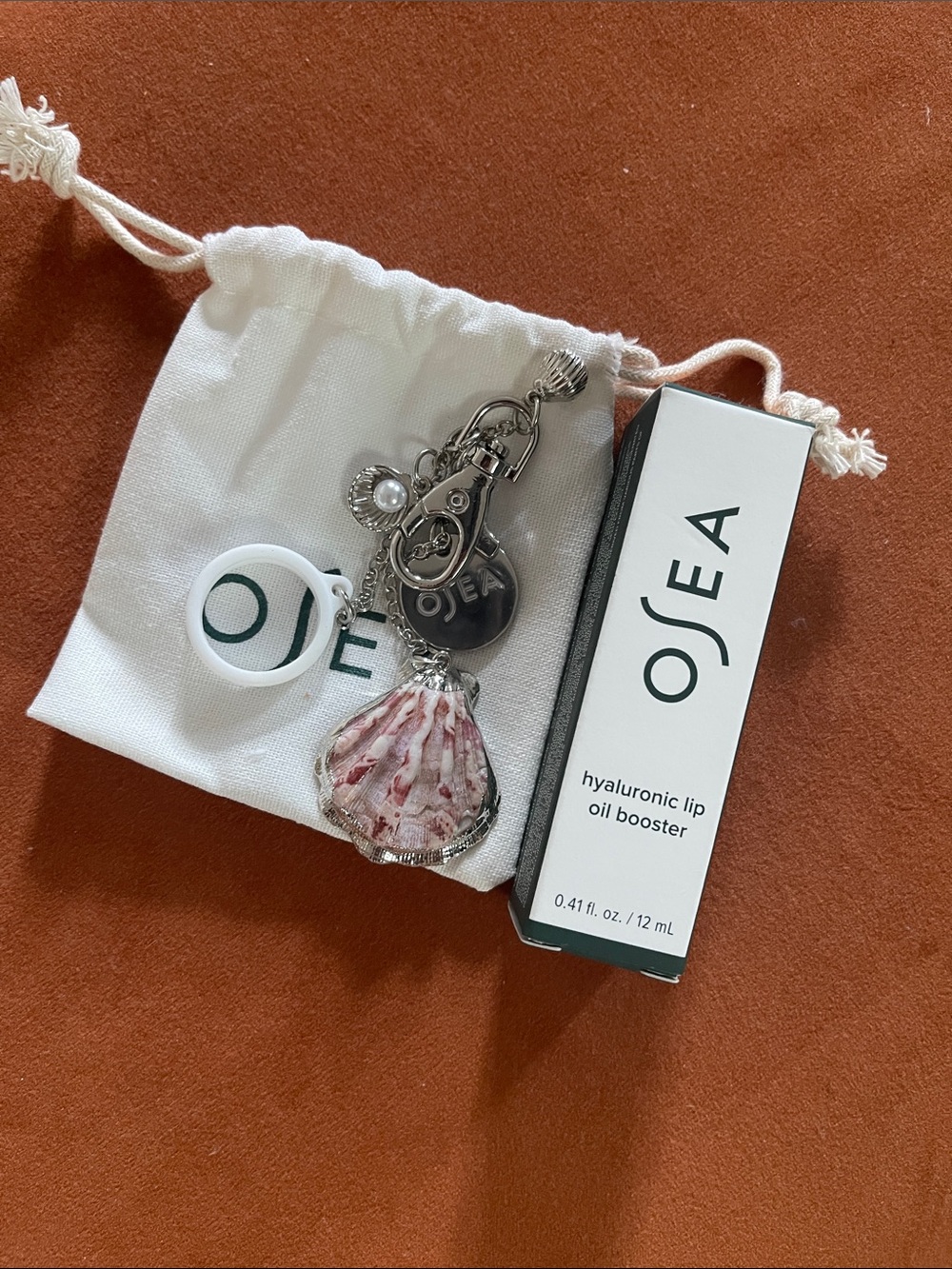 Brand new Sea Pink and Silver Shell Brooch Charm and hyaluronic lip oil booster